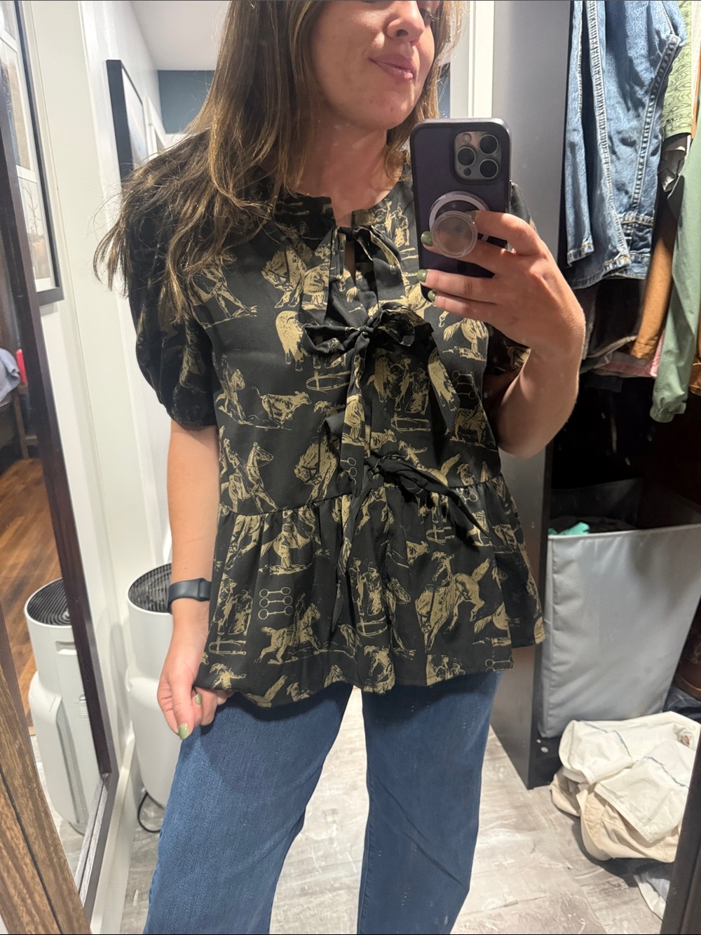 Woven Ruffle Tie-Neck Peplum Top in Black with Gold Print